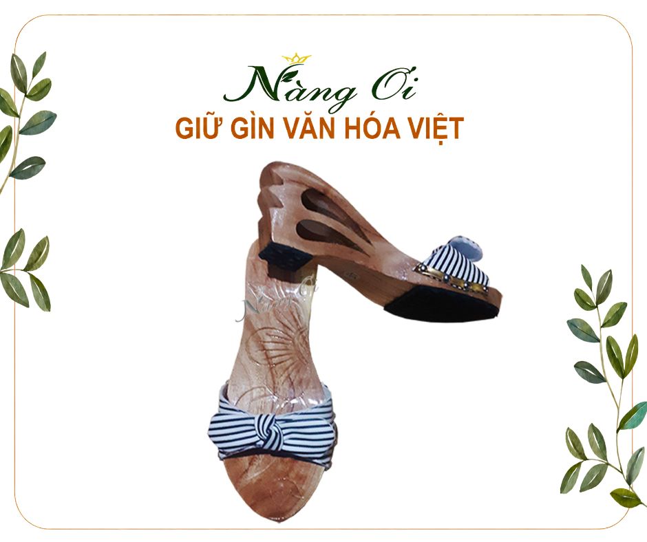 guốc mộc được chạm hai giọt nước mềm mại với chiều cao 8cm chắc chắn